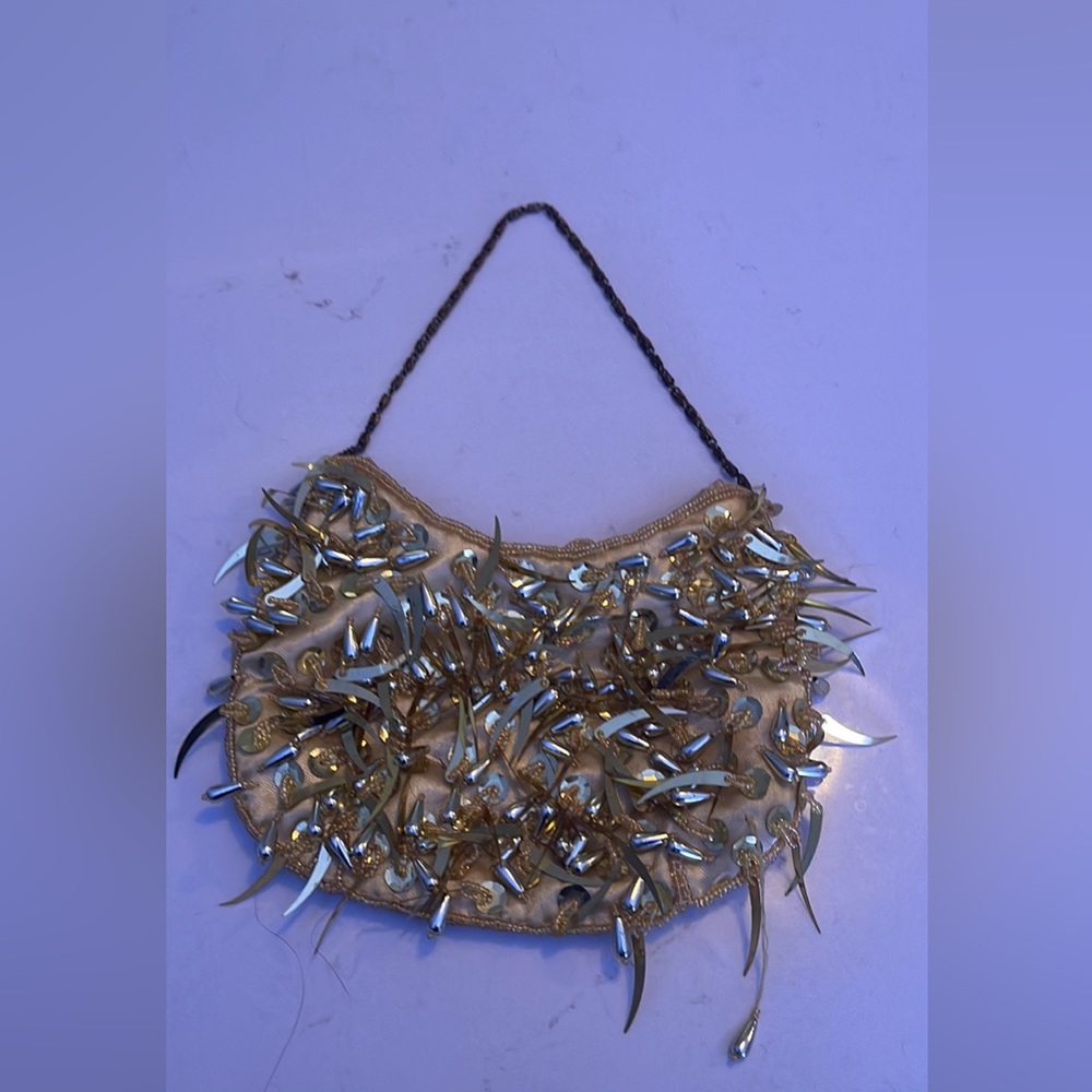 Beaded golden clutch bag
